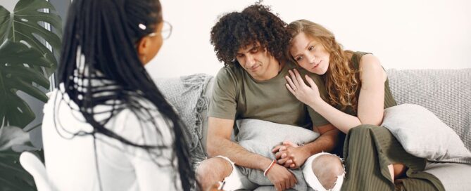 Two people in a supportive counseling session discussing mental health in Montana